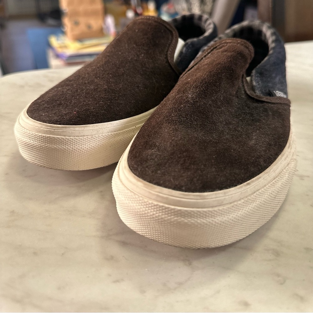 Vans slip on sneakers.